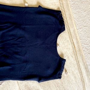 Blue sleeveless sweater with detail